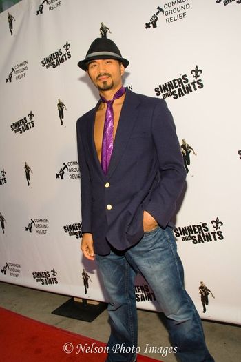 Sidow Sobrino poses for the paparazzi during a red carpet event in Hollywood  for the Film Sinners and Saints
