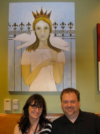 Here I am with artist Tiger Wiese Jones at a showing of her art. On the wall behind us is her painting "Mary, The Queen of Birds", inspired by one of my songs. I am so flattered!
