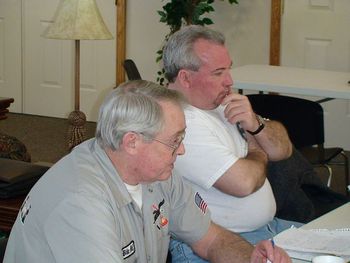 Tim "Doc" Anderson (left) and Tom Caine at recent VetAid board meeting.
