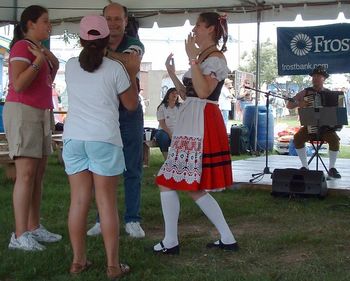 Guests in the audience join us for  the Blacksmith, a traditional Bavarian folk dance at The Texas Folklife Festival 2007
