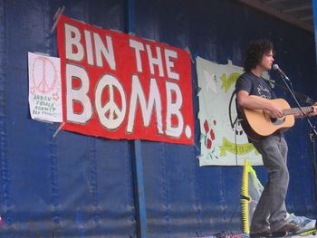 David singing in George Square, Glasgow, at a Bin The Bomb event on the Long Walk For Peace (September 2006), during which David was the resident musician. Over 60 marchers walked 85 miles for 5 days from Faslane's WMD base to Edinburgh's Parliament.
