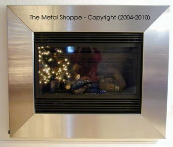 Stainless Steel Picture Frame Style Fireplace Surround for gas insert / Location: Fresno, CA
