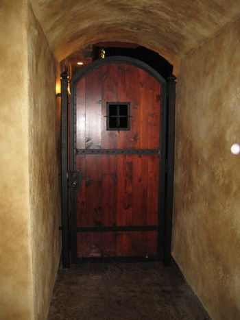 Custom Courtyard Entry Door - Forged Iron Frame with Iron Speak Easy Location: Kingsburg, CA
