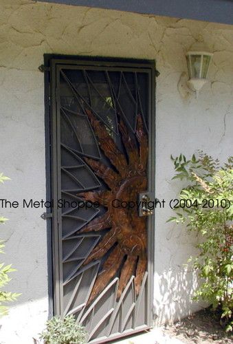 Custom Fabricated Copper and Steel "Sunburst" Security Door / Location: Fresno, CA Collaboration with A Copper Rose Metal Art
