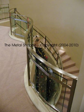 Custom Formed and Welded Stainless Steel and Glass Curved Railings 3
