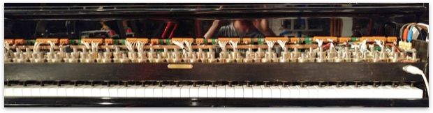 Automatic piano interface attachable to all piano’s