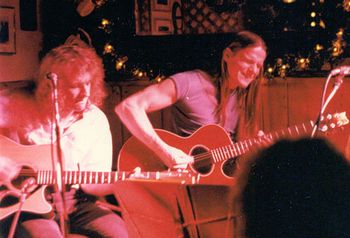 Dave Iglar plays acoustic guitar with Steve Morse.
