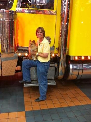 Annabella Wood, truck driver extraordinaire, with her dog Quark in Walcott, Iowa. 6/8/11
