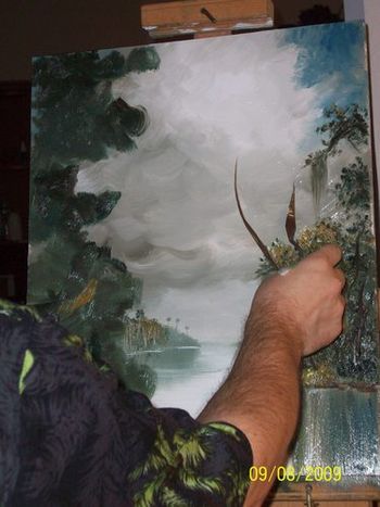 painting in the tree trunk with a knife
