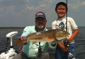 Thanks for a wonderful day out on the water. Nothing better than seeing the smile on Sean's face after pulling in a 27" red. Sincerely, Li-Ming Su, M.D.
