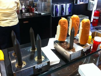 The bizarre hotdog maker on the ferry. Medieval torture hotdogs anyone?
