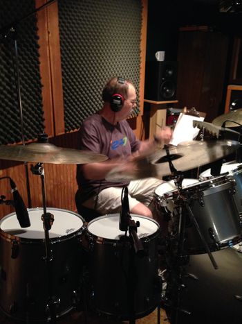 Steve Holland plays kit and hand percussion on the tracks. Nothing harder than trying to photograph a drummer...
