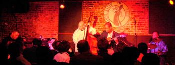 Earl Klugh Quartet.  (l-r) Al Duncan-keys, flglhrn, trombone, Scott Glazer-bass, Earl Klugh-guitar and Yonrico Scott-drums. Blues Alley, Washington, D.C. 2007

