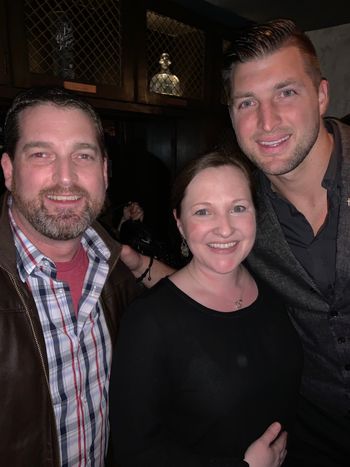 With Tim Tebow

