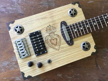I made this Lino print design for my Custom ‘Heart of Texas’ Box Guitar, created by Delaney Guitars.
