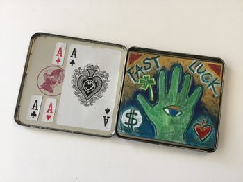 Inside, is my personal ‘Fast Luck’ mojo: playing cards, and small carved & painted wooden insert
