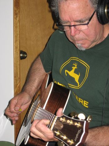 The Late GREAT Kenny Edwards, playing one (of his many) acoustic guitars.
