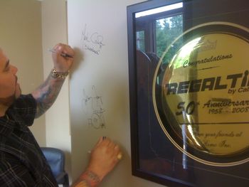 Marky signing the Regal Tip Wall of Fame
