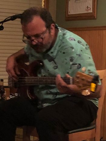 John Luce, getting down on the bass
