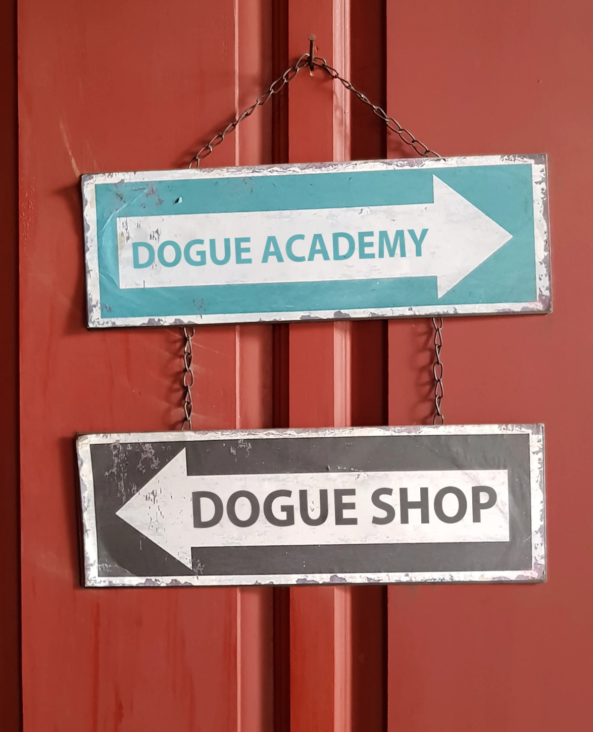 Dogue Shop and Dogue Academy street sign hanging on door