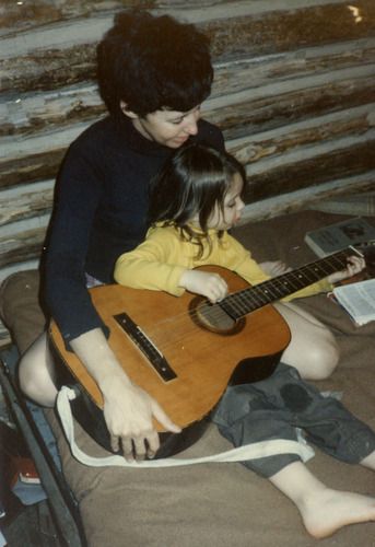 Mary learning guitar (age 4)
