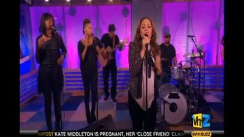 Sheri Hauck performing on CBS behind Grammy nominated recording artist Tamia on VH1's The Buzz.
