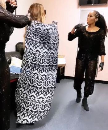 Sheri Hauck in the dressing room discussing stage blocking with Recording Artist Tamia before performance.
