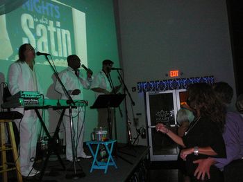The A Train performs at the "Nights in White Satin" party
