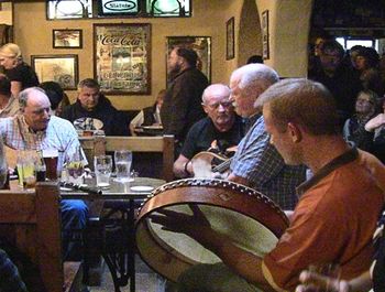Playing the bodhran with a traditional Irish band in Doolin, Ireland (Gus O'Connor's Pub)
