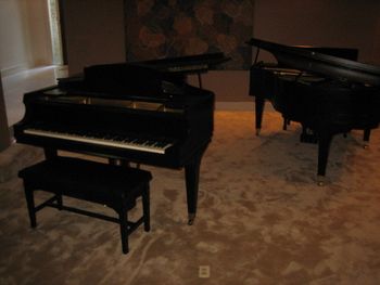 Finished pianos in the same room ( dueling style) The finish is a PPG Acrylic Alkyd Enamel with a urethane additive,Semi gloss Ebony, everyone loves this color. Black always goes with everything.
