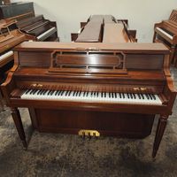 1987 Chickering Console with bench.