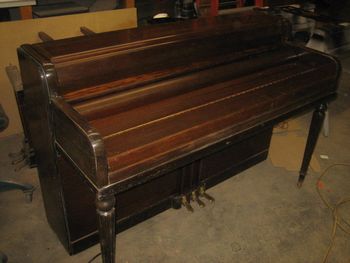 1942 Wurlitzer spinet cleaned up pic was taken before we installed a new music rack. Method for reviving the dead finish was 00 steel wool, furniture paste wax and a ton of elbow grease.
