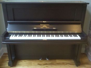 Same 1911 Steinway Model K , refinished back to Ebony with satin clearcoat, New key covers, Decal some of the missing parts were made from scratch. Shown delivered in its new home
