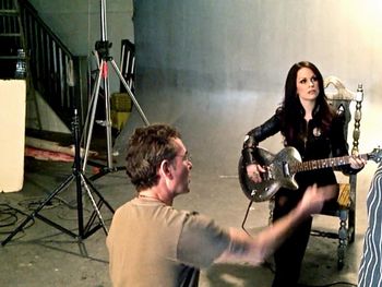 BTS photo of Neil Zlozower and Raven Quinn from the "Not in Vain" album photo shoot - photo by Rob Jones
