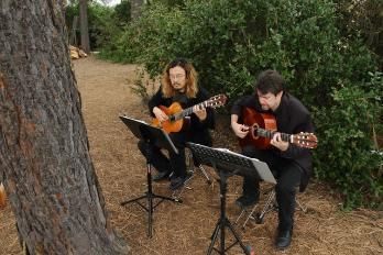 Dressed up and playing classical duets with Claudio
