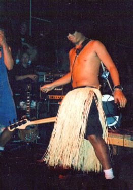 Beanz doing the hula dance on stage
