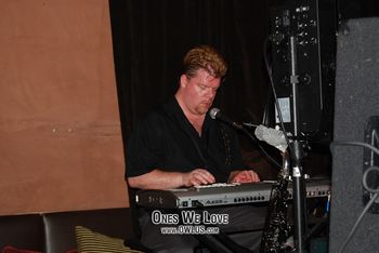 Playing keys in Rolling Stones tribute band "Satisfaction" in 2007
