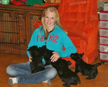 Grand daughter Karlie playing with  Cozzettes puppies
