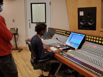 Jahirah capturing a track in studio
