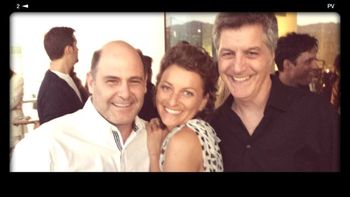Audrey Bernstein surrounded by Mad Men's Matthew Weiner and David Carbonara
