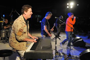 performing in Kandahar with Sam Reid and Alan Frew of Glass Tiger
