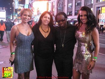 Two supporters, Mr. Glamarus and Celebrity guest host "Michelly Finley" from Brazil in Time Square NYC supporting THE RHYME IMPERSONATOR SHOW LAUNCH PARTY.
