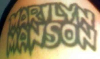 My first tattoo. A "Marilyn Manson" logo from the Portrait Of An American Family era. It's on my upper right arm.

