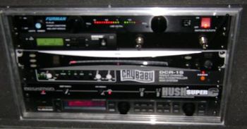 My rack. What's in it you ask ? Here's what's in it: Furman PL-Plus Power Conditioner Shure ULXS14 Wireless System KORG DTR-1000 Tuner Dunlop DCR-1S Crybaby Rack Wah w/ two controllers Rocktron Hush Super C T.C. Electronic G Major (Used in the effects loop of the 6505 head for a clean chorus sound)
