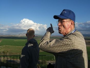 Bro. Tom Crouch giving a devotion on the Tel of Meggido overlooking the valley.
