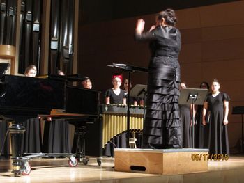 Their conductor, Rossana Cota.
