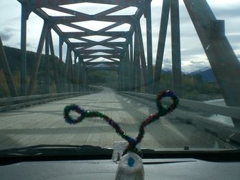 Crossing a bridge through the Rockies with a little friend we picked up while in Revelstoke
