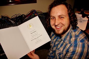 Receiving 1st Grammy Certificate (2012). Photo by KMG*Photography.
