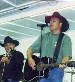 Joe seen here backing up Houston country music star Doug Supernaw at a Cat Country 98.1 show.
