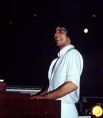 Gene O. performing with his rock band, TIFFANY
